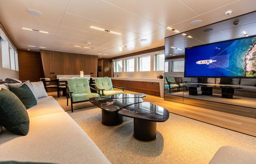 Charter yacht ZEEMAR interior seating with large TV