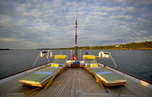 sun loungers on aft deck of charter yacht Whisper