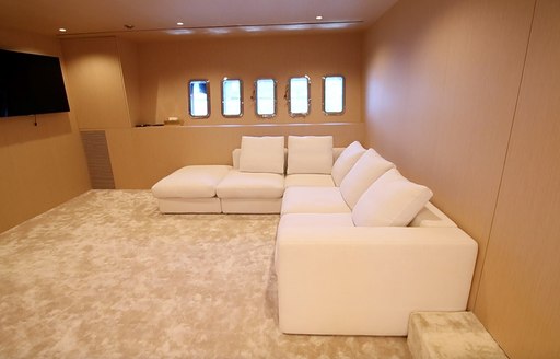 Sofas and TV on charter yacht NEOPRENE