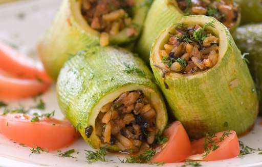 Stuffed squash with rice and tomato salad