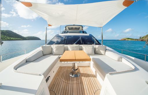 Charter yacht SQUALO sun pads and bimini 