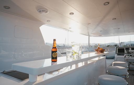 View across covered bar area on board explorer yacht SEAL