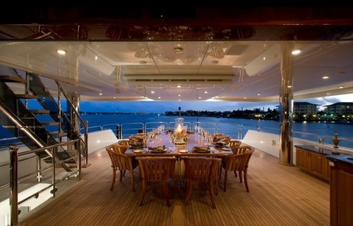 Alfresco dining table on superyacht Casino Royale