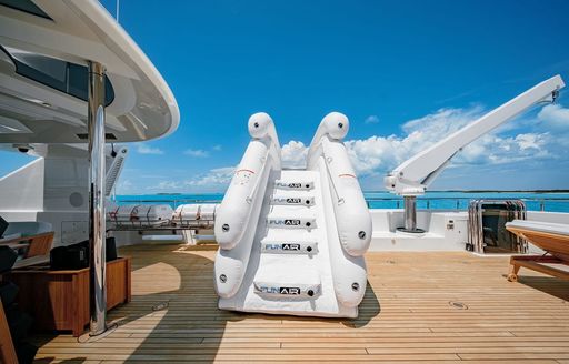 Charter yacht AS YOU WISH waterslide inflated on deck