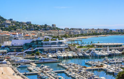 Overview of Vieux Port in Cannes, with many boat charters berthed