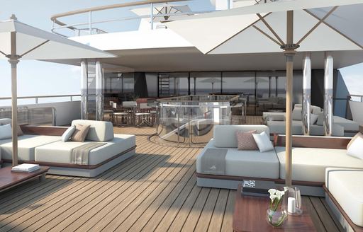 Charter yacht GRAND OCEAN exterior seating area with parasols