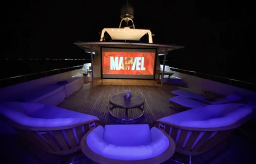 Outdoor cinema at night on superyacht LIONSHARE