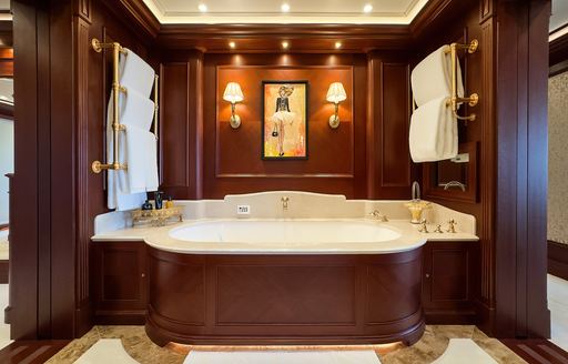 Ensuite facility with large bath tub onboard superyacht charter GIGIA