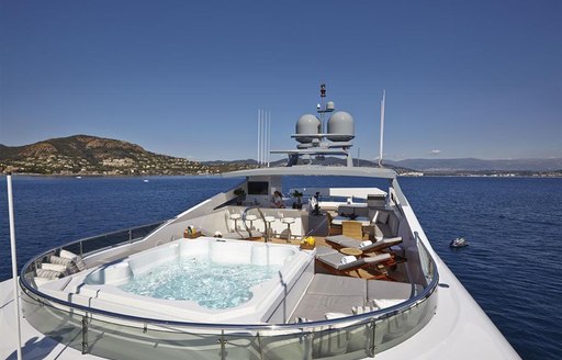 Luxury charter yacht and its attendant views