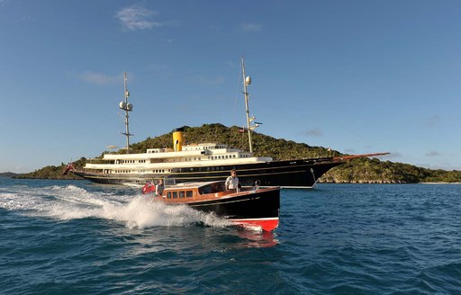 Charter yacht NERO with her tender beside her