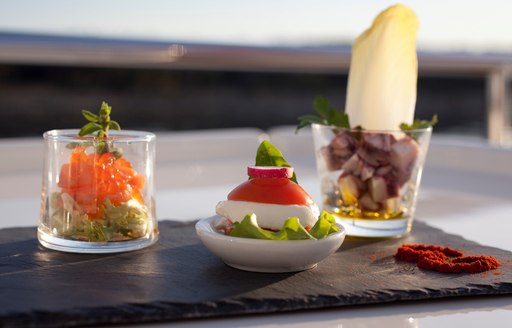 selection of delicious dishes served on superyacht