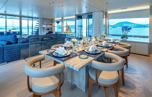 Interior dining area onboard charter yacht ARSANA