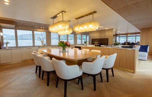 Interior dining area onboard charter yacht SCORPIOS