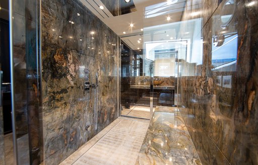 marble walls in the en suite of benetti luxury yacht happy me