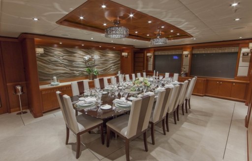 The formal dining area of motor yacht SKYFALL