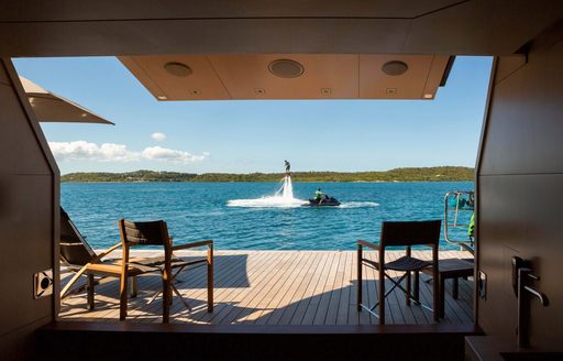 Charter yacht SIREN view from beach club