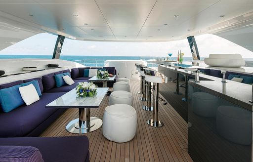 Superyacht charter ELA exteriors with wet bar and seating