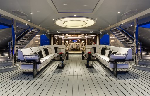 seating area on main deck aft of motor yacht OKTO 