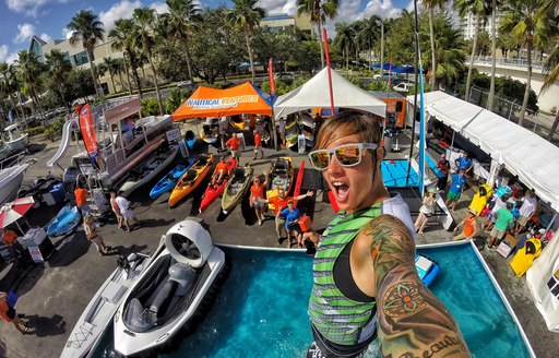 Woman performs at Aquazone during FLIBS