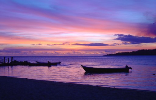 A beautiful purple, pink and blue sunset in Plantation (Malolo) Island, Fiji