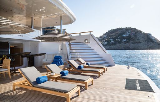 Swim platform and sun loungers onboard charter yacht BOADICEA