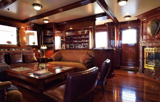 main salon in Cuban mahogany on board expedition yacht STEEL