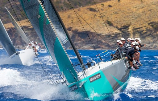 close up of crew on sailing yacht competing in the Les Voiles de St. Barth 2015