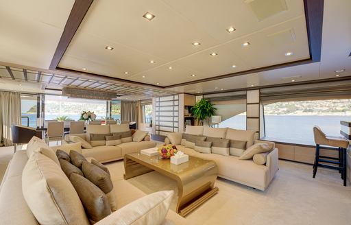 Lounge area in natural hues onboard charter yacht NELA