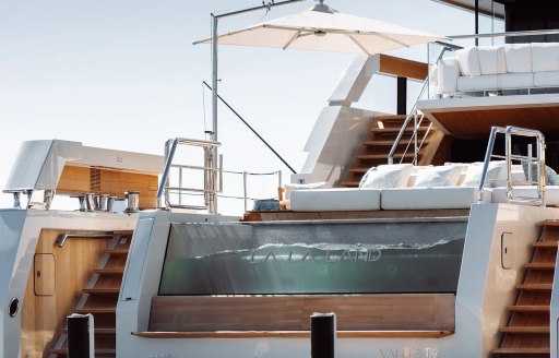 Overview of the infinity pool on the aft deck onboard charter yacht LA LA LAND