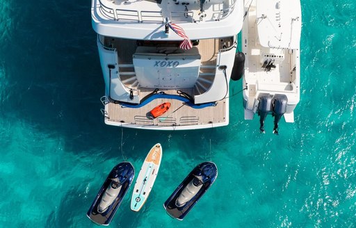 Charter yacht XOXO aerial view of swim platform and water toys ready