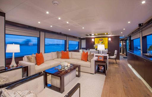 L-shaped sofa in contemporary main salon of charter yacht ‘Lady Carmen’