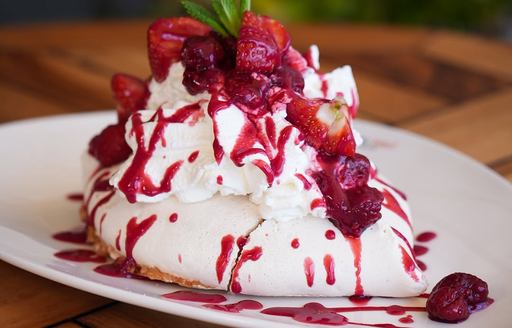 Close up of a meringue dessert on a white plate