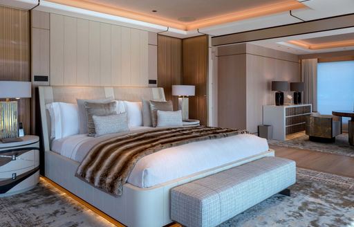 Guest cabin with central berth onboard charter yacht RENAISSANCE