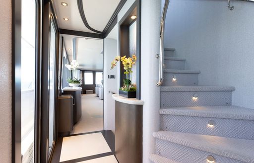 Charter yacht MEMENTO VIVERE interior corridor with staircase