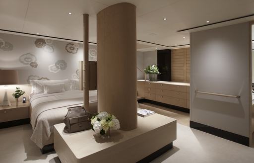 Superyacht TWIZZLE master cabin with large bed and neutral toned furnishings