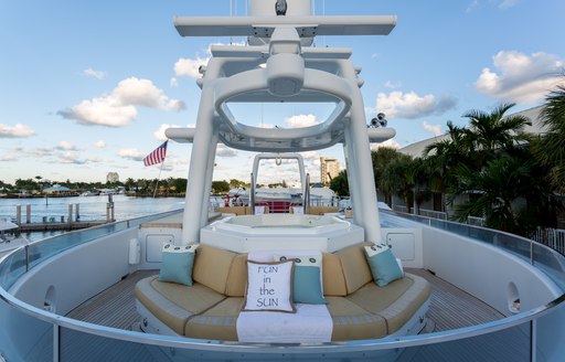 Jacuzzi and surrounding seating on sundeck of motor yacht STARSHIP 