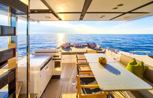 Charter yacht MUDITA aft exterior deck with alfresco dining option