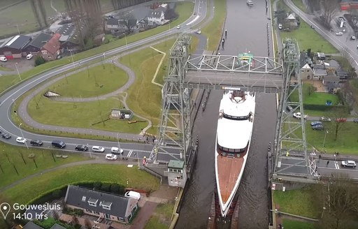 Drone shot of megayacht Lady S on the canals in Holland