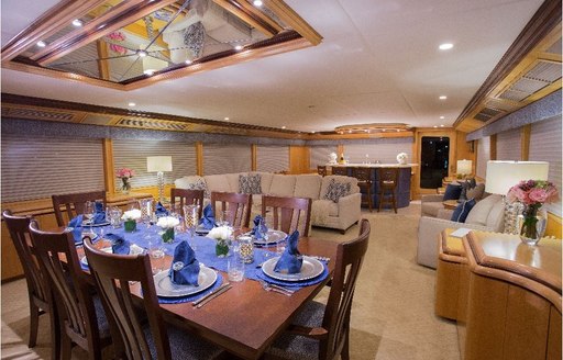 The formal interior dining on board luxury yacht Kelly Anne