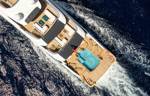 Superyacht charter SYMMETRY aerial view of aft decks