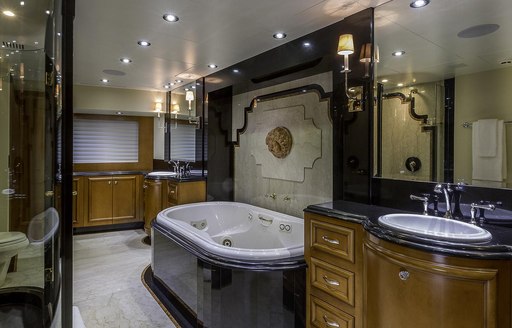 Ensuite with bath and sink on on superyacht M3