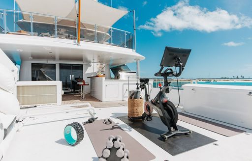 Charter yacht MEMENTO VIVERE outdoor gym set up on deck