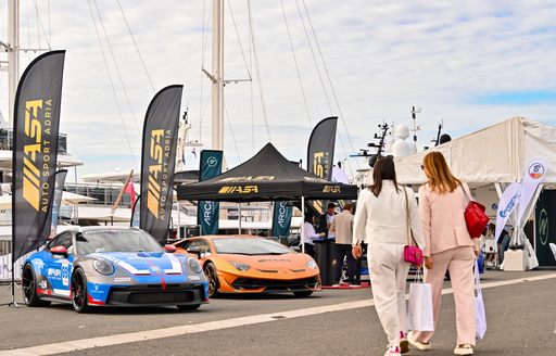 Supercars and show visitors on the docks of the Croatia Yacht Show