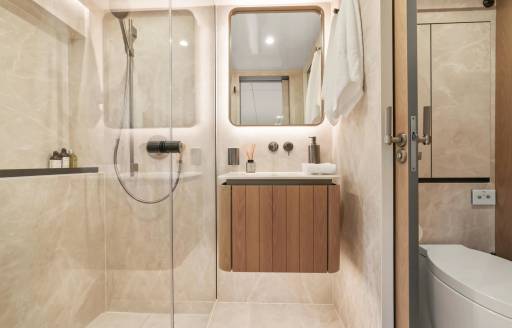 Charter yacht AMITATU ensuite with shower cubicle and sink unit