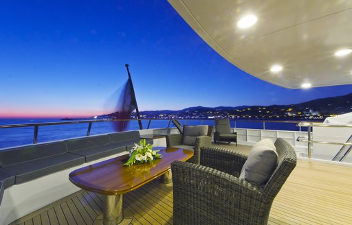 Alfresco louging on upper deck aft of motor yacht Axantha II