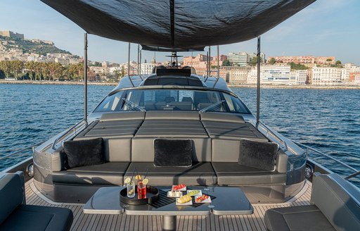 Overview of the sun pads onboard charter yacht SOPHIA, with shelter from a bimini