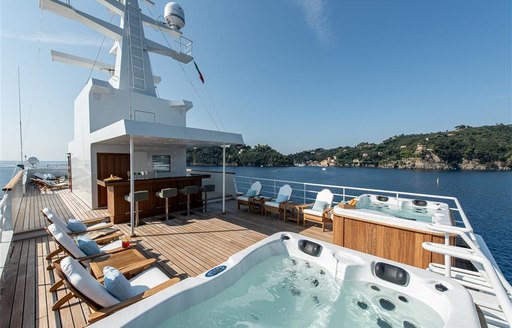 Sundeck including Jacuzzi on superyacht Bleu De Nimes