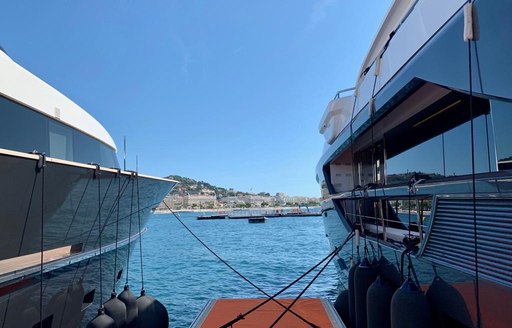 2 yachts alongside each other at Cannes Yachting Festival 2019