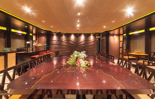 Interior dining onboard charter yacht TRIDENT