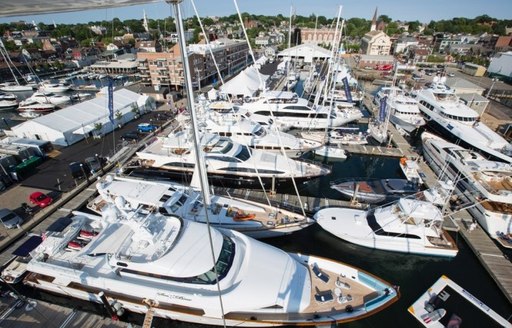 yachts lined up for the Newport Charter Yacht Show 